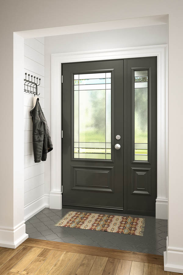 A dark grey entry door (view from inside) with Celeste glass inserts on an Orleans door slab.