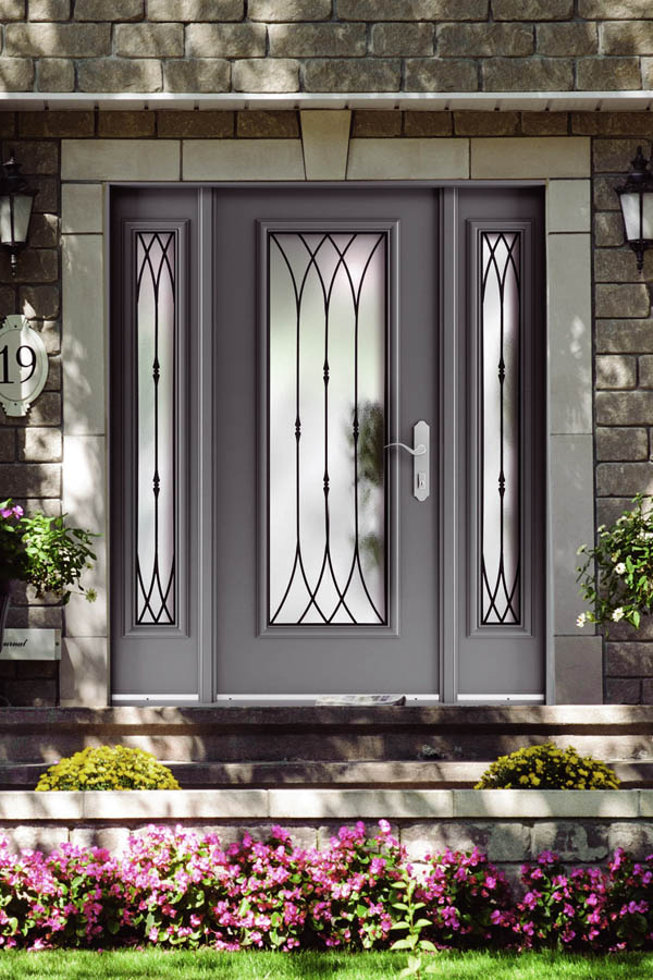 A grey entry door with Corsica glass inserts on a Flat door slab.