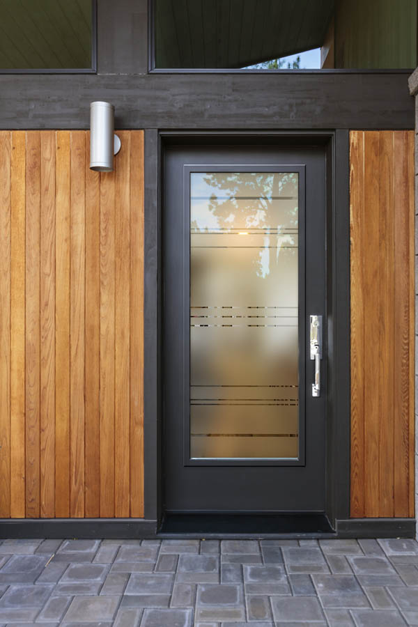 An entry door with Fragrance glass inserts on a Flat door slab.