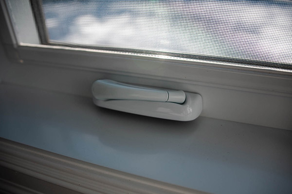 The interior view of a low-profile nesting crank handle for a replacement window.