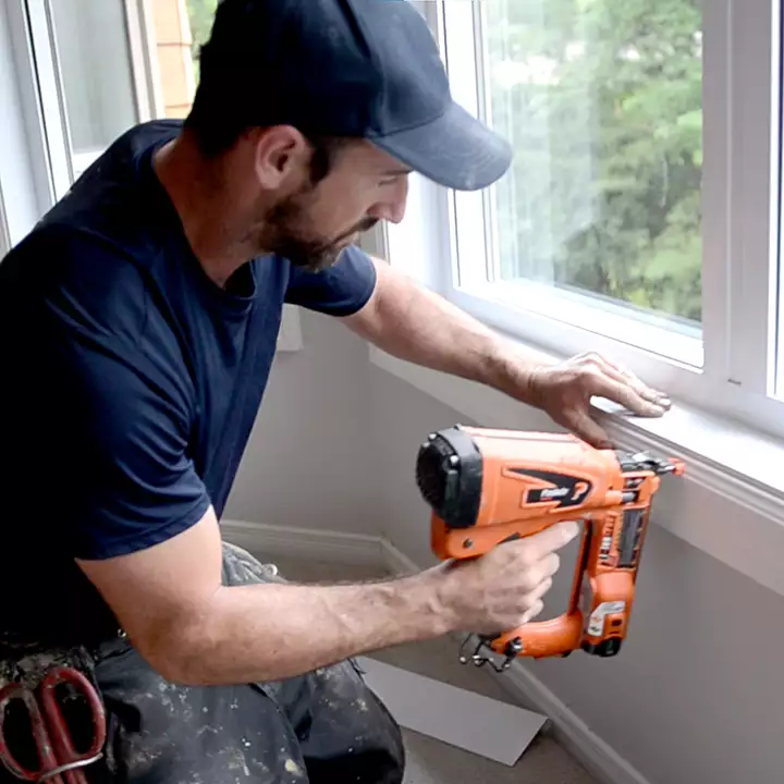 nordik installer puttin new finishes on a new double casement window