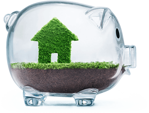 A glass piggy bank with a home growing from the soil.