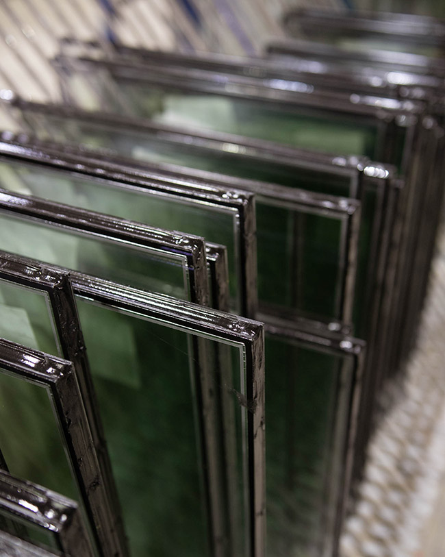Several sealed thermo panes filled with argon gas for replacement windows.